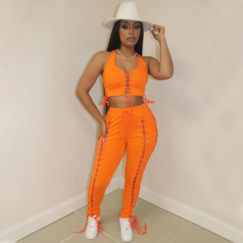 Bold Lace-Up Sleeveless Top and High-Waisted Pants Two-Piece Set
