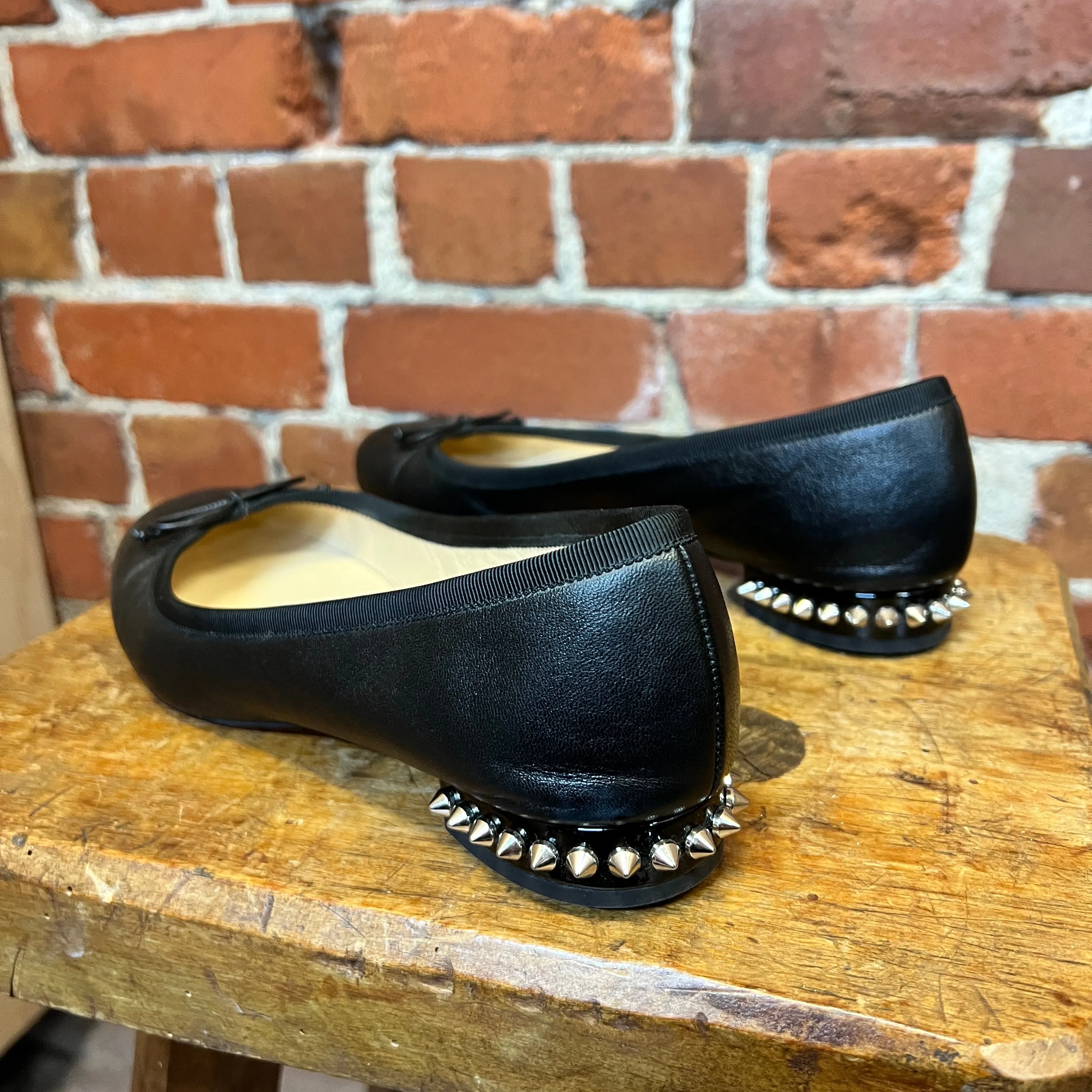 CHRISTIAN LOUBOUTIN Studded flats 39