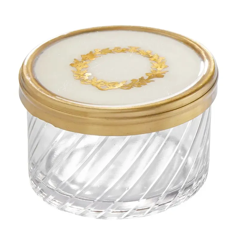 Decorative small gold wreath glass lidded jar