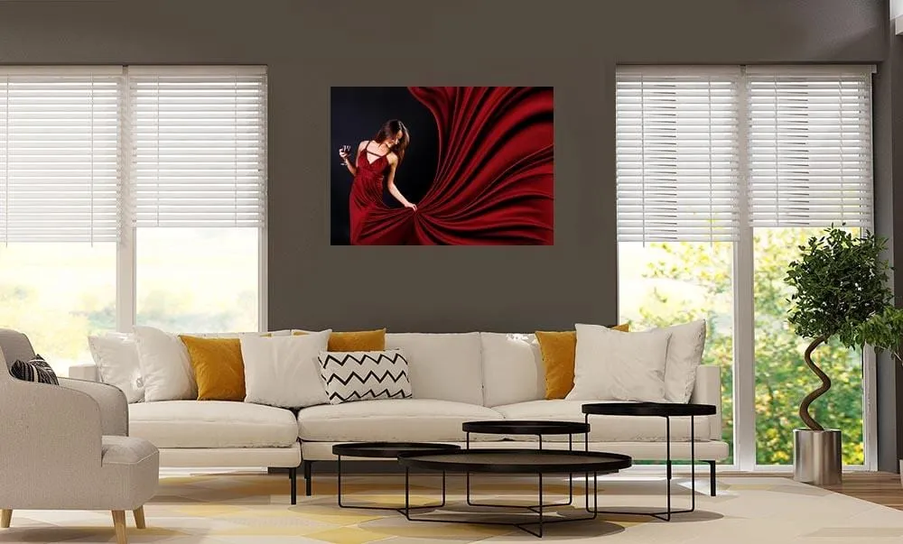 woman in red holding glass of red wine poster